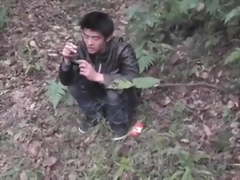 Asian convinced to jerk off in the woods