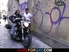 Hot looking biker is seduced by a gay