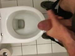 Masturbating in public toilet